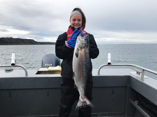 Girl holding king salmon Ninilchik Alaska