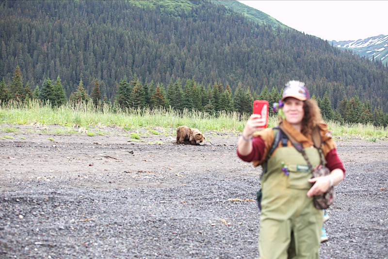 Woman taking a selfie on bear viewing trip in Lake Clark National Park